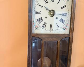 Antique wood pendulum wall clock with painted floral dial