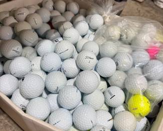 Large lot of golf balls, dozens
