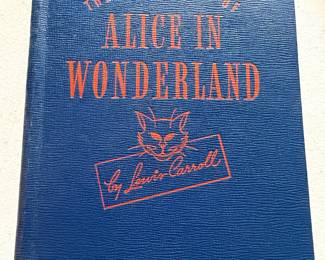 vintage hardcover edition of Alice's Adventures in Wonderland by Lewis Carroll, published around 1945. 