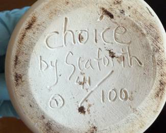 vintage ceramic face vase features a stylized, matte white embossed head