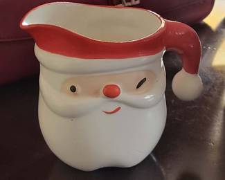 vintage ceramics are a Napco or Holt Howard "Winking Santa" creamer and mug set from the 1940s-1960s. 