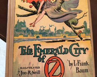 vintage hardcover copy of "The Emerald City of Oz" by L. Frank Baum, illustrated by John R. Neill. 