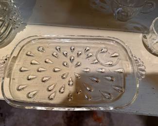 a vintage Hazel Atlas snack set from the 1940s or 1950s, featuring a clear pressed glass design known as the "Teardrop" pattern. 