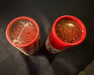 vintage Hallmark cardboard tubes featuring Christmas scenes of Santa Claus, commonly used as decorative match holders. 