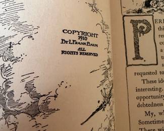 vintage hardcover copy of "The Emerald City of Oz" by L. Frank Baum, illustrated by John R. Neill. 