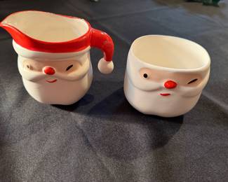 vintage ceramics are a Napco or Holt Howard "Winking Santa" creamer and mug set from the 1940s-1960s. 
