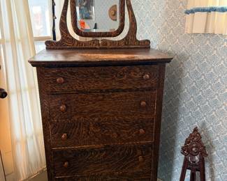 Antique dresser with mirror from Northern Furniture Company, dating to the 1910s–1920s, features quarter-sawn oak with a distinctive "tiger oak" grain.