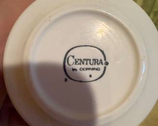 vintage dish set is identified as the Corning Centura April Tulip pattern, produced between 1972 and 1978. 