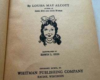 vintage hardcover edition of the classic novel "Eight Cousins" by Louisa May Alcott, published by Whitman Publishing