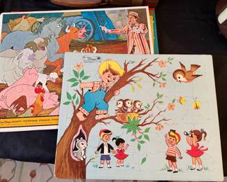 a collection of vintage frame-tray puzzles from the 1960s