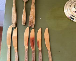 vintage set of gold-toned flatware