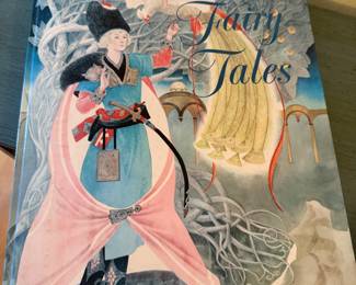  a vintage hardcover copy of "Russian Fairy Tales" published as part of the "Giant Golden Book" series. 