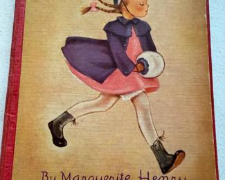  a vintage hardcover children's book titled Geraldine Belinda by Marguerite Henry, illustrated by Gladys Rourke Blackwood and published by Platt & Munk in 1942. 