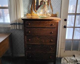 Antique dresser with mirror from Northern Furniture Company, dating to the 1910s–1920s, features quarter-sawn oak with a distinctive "tiger oak" grain.