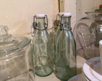 swing-top or hermetic glass bottles commonly used for storing beverages. 