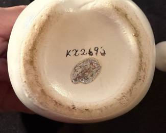 vintage ceramics are a Napco or Holt Howard "Winking Santa" creamer and mug set from the 1940s-1960s. 