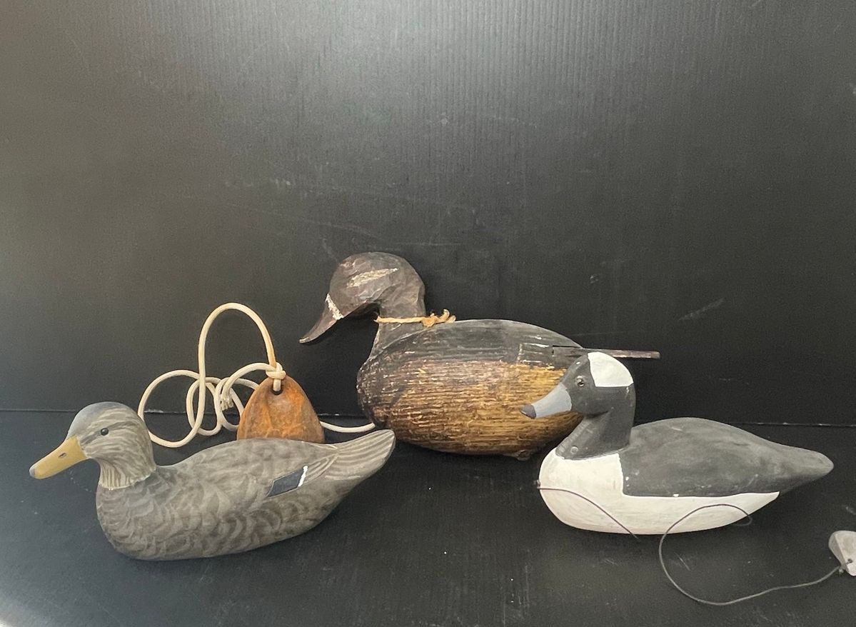 Carved Wooden Duck Decoys signed Herli Daisy Jr. and A.A. Waterfield