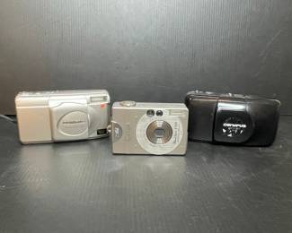 Canon PowerShot Digital ELPH S100, Olympus Infinity Zoom 80, and Olympus Stylus Zoom Film Cameras