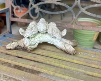 Concrete bird statuary.