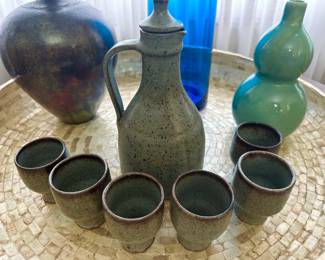 Mid century pottery, on a huge vintage pier one capiz shell tray.