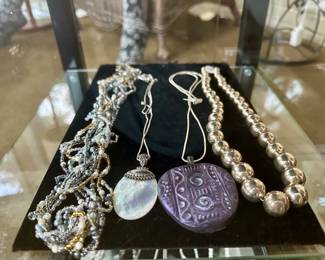 Showcase full of sterling silver jewelry, as well as Brighton jewelry.