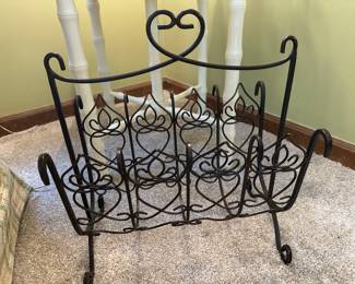 Wrought iron magazine rack.