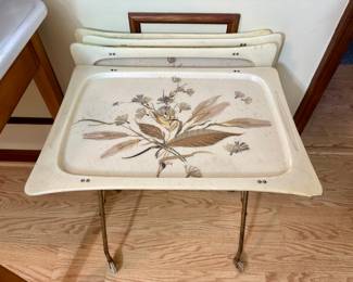 Mid century Lavada fiberglass tray table set.