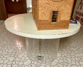 Thick MCM plexiglass table base. 