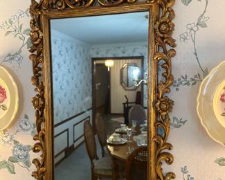 Beautiful gold Hollywood Regency style mirror.