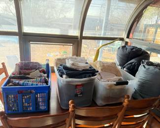 Table cloths; bedding; curtains; sleeping bages; linens