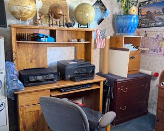 Printers; computer towers; desk; metal and wooden drawers; tripods; desk chairs