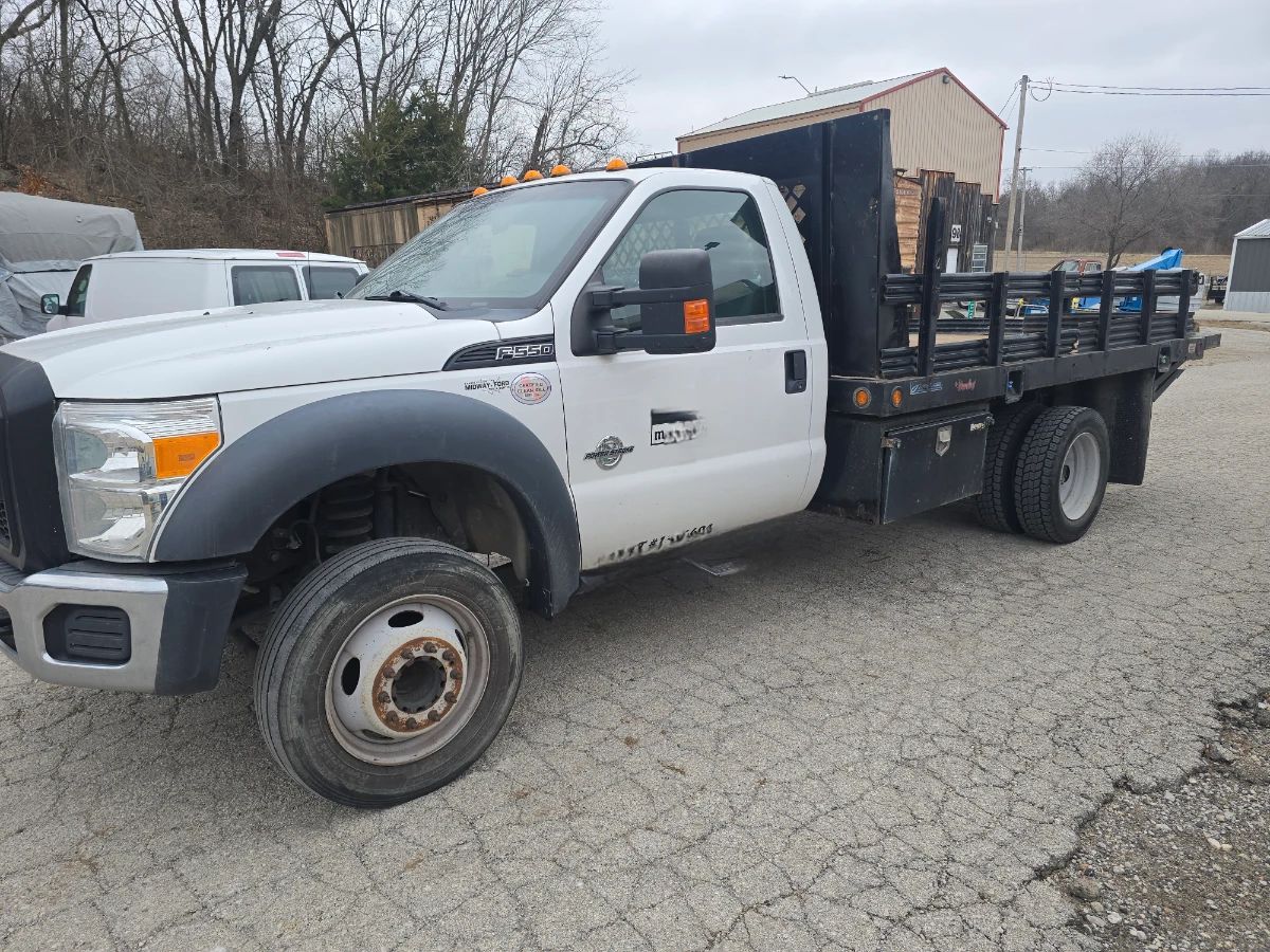 2016 Ford F550 Flat Bed Work Truck w/ Lift Gate 265,000 miles. This truck is ready to go to work