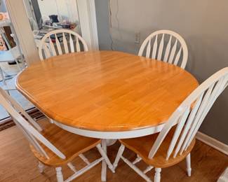 Buylateral Lancaster farmhouse-style five-piece dining set- natural wood-finished table and four white spindle-back chairs. 
