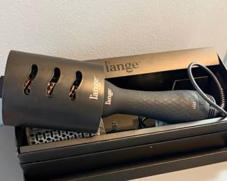 L'ange Hair Le Volume 2-in-1 Titanium Brush Hair Dryer.