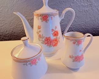 Coffee Pot, Creamer and sugar Tienshan or Crown Ming “Christina" pattern, featuring pink roses and gold trim.