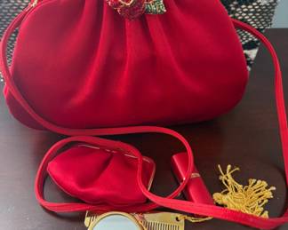Judith Leiber red satin evening clutch