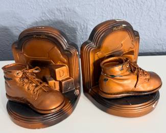 Vintage copper-dipped baby shoe bookends 
