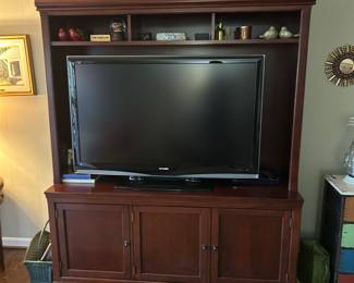 82 inches high by 22 inches deep x 65 inches wide
5’ opening for TV
