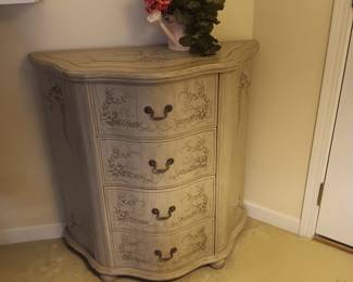 Modern painted 4 drawer Bombay style chest. Lightweight, probably made in India or China, has 4 drawers that are lined with flocked black paper. It measures 34" tall, 33.5" wide, and 14.5" deep at the widest spot which is the center, good condition, $95.