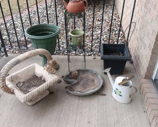 planters and ground bird bath