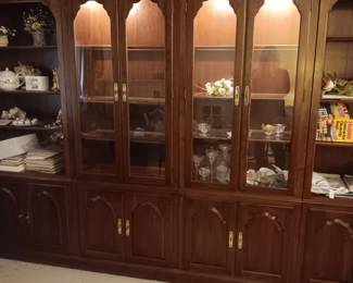 Each of the 4 units measures 30" wide, 80" tall and 15" deep.  Together it measures 120" across.