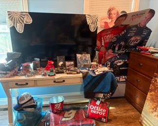 60" Television with remote.  POLK soundbar with remote, Desk, Nascar items