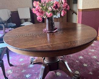 Stately round dining room table with impeccable details... and expands... 