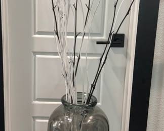 tall smoky glass vase with reeds
