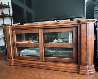 Wooden Media Console with Sliding Glass Doors and Stepped Base