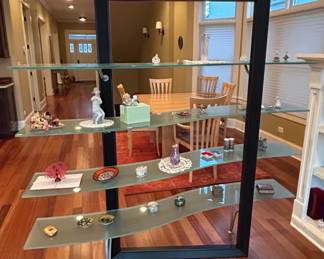 Cattelan Italia Flexa Style Glass Bookshelf with Assorted Decorative Miniatures