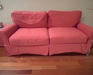 Coral Pink Slipcovered Sofa
