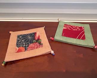 Beaded Handle Serving Set, Decorative Trivet, Pottery Barn Napkins, Wooden Chopsticks, Lacquered Chopsticks, and Fabric Coasters fifth image