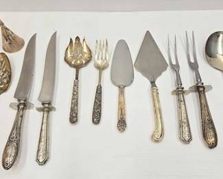 1000  Stainless Steel Utensils with Sterling Silver Handles 