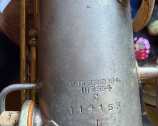 vintage silver-plated saxophone by 
C.G. Conn C Melody  dated 1914